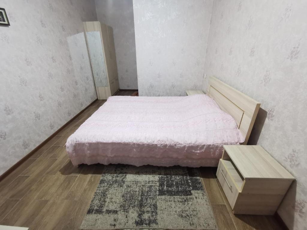 Llit o llits en una habitació de Grimis Villa