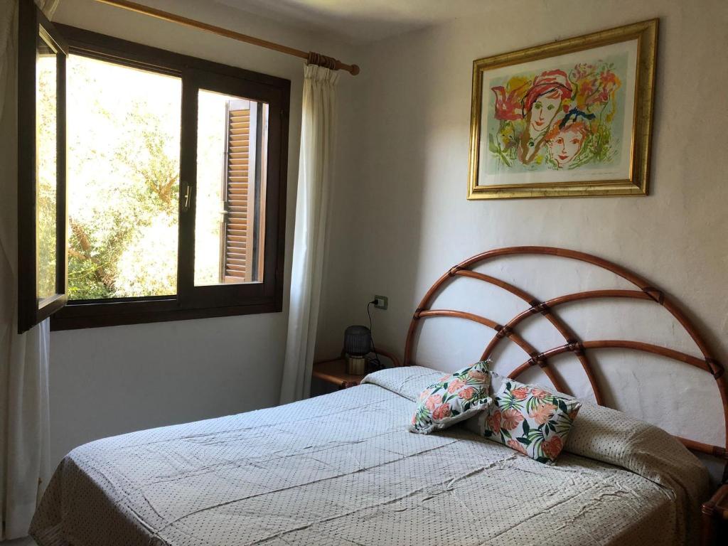 Posteľ alebo postele v izbe v ubytovaní Guest Host - Two Apartments in Aldiola Porto Rotondo