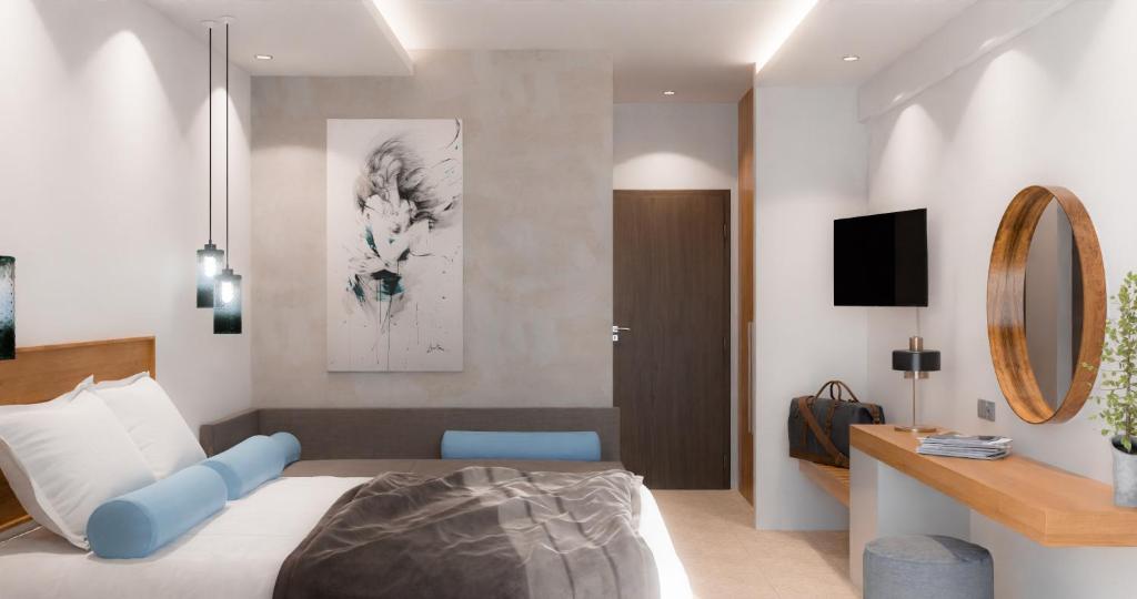 Postel nebo postele na pokoji v ubytování Hotel Aethria