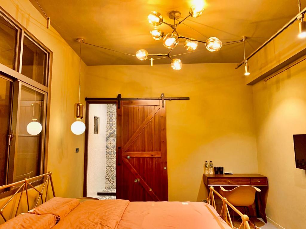 Postel nebo postele na pokoji v ubytování Hinoki Mansion
