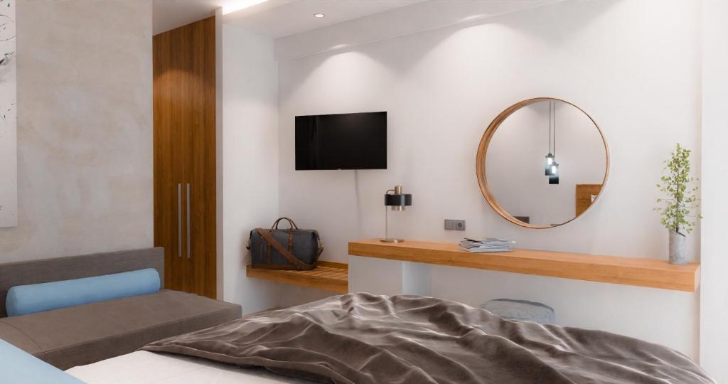 TV a/nebo společenská místnost v ubytování Hotel Aethria