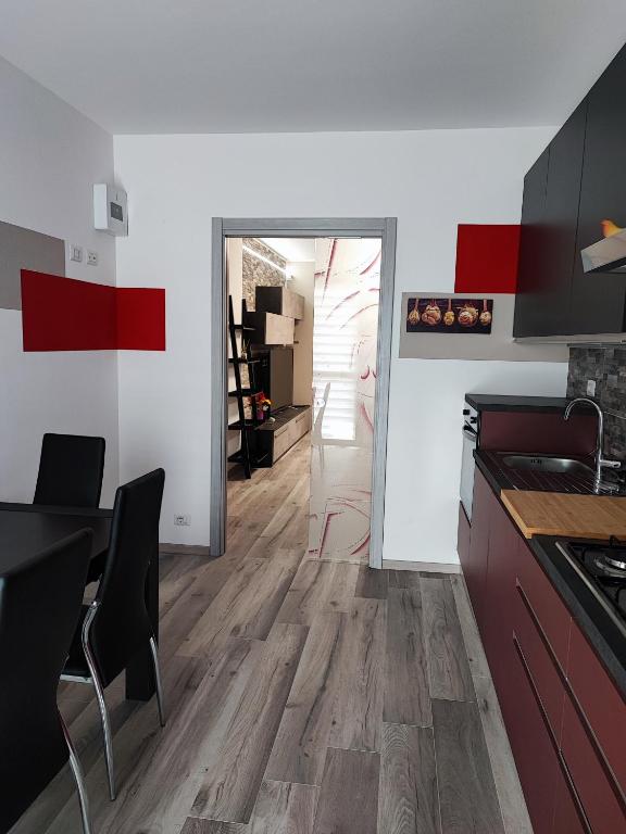 Kuchyň nebo kuchyňský kout v ubytování CASA ASSIETTA