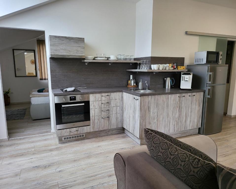 Kuchyň nebo kuchyňský kout v ubytování Apartments Gerda