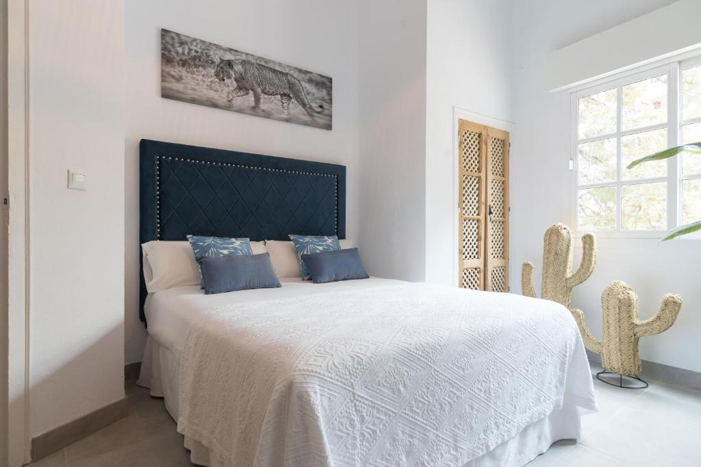 Posteľ alebo postele v izbe v ubytovaní Apartamento Juan de Austria