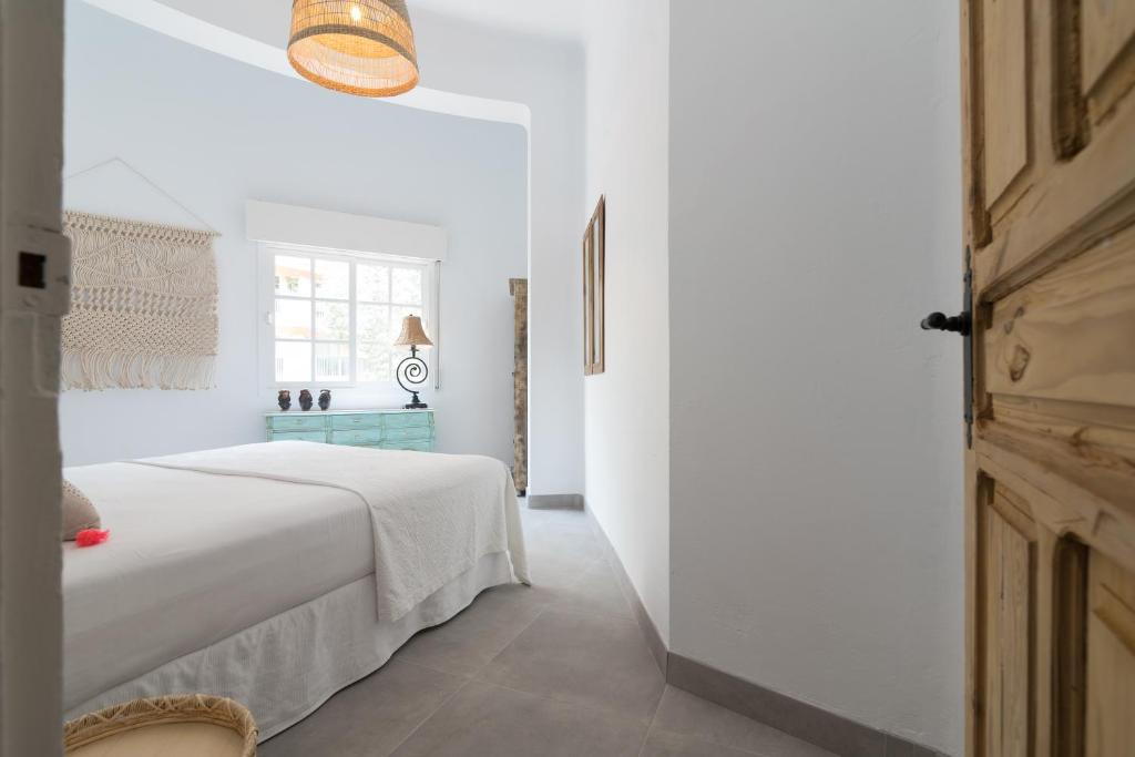 Posteľ alebo postele v izbe v ubytovaní Apartamento Juan de Austria