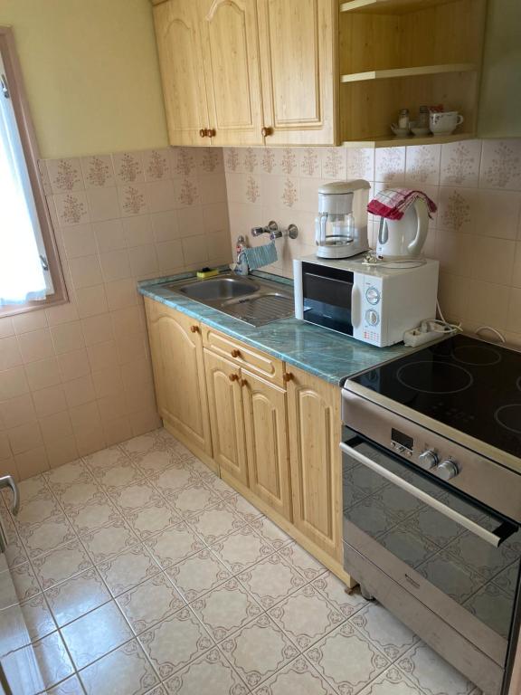 Kuchyňa alebo kuchynka v ubytovaní Home Sweet Apartment XL