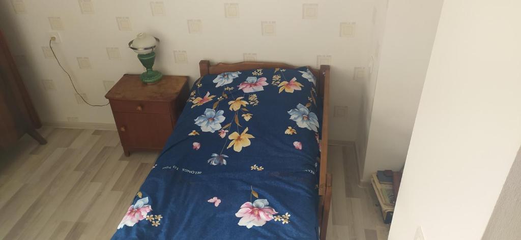 Postel nebo postele na pokoji v ubytování GEO Vake Guest House