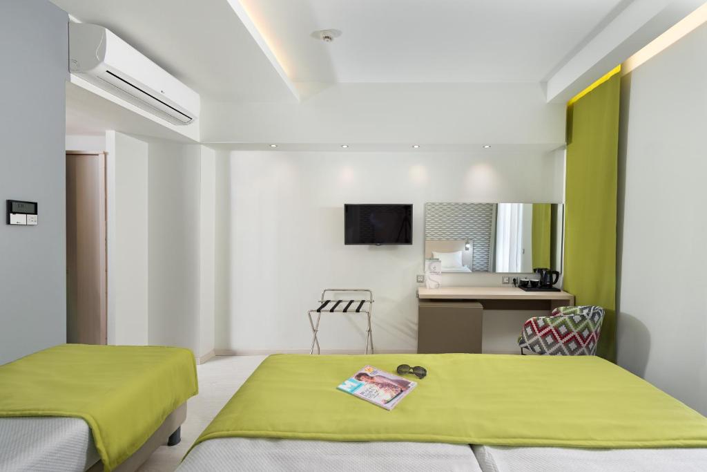 Postel nebo postele na pokoji v ubytování Semiramis City Hotel