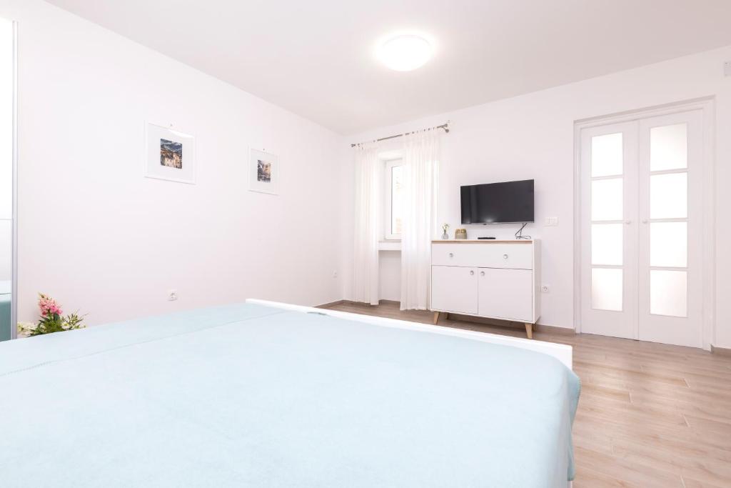 TV a/nebo společenská místnost v ubytování Apartment Morris