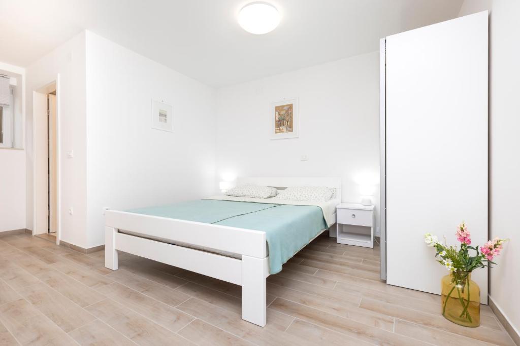 Postel nebo postele na pokoji v ubytování Apartment Morris