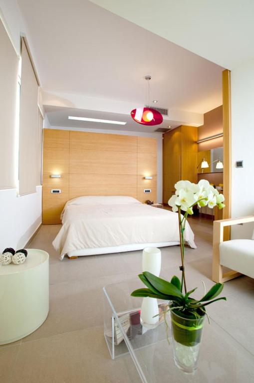 Postel nebo postele na pokoji v ubytování Semiramis City Hotel
