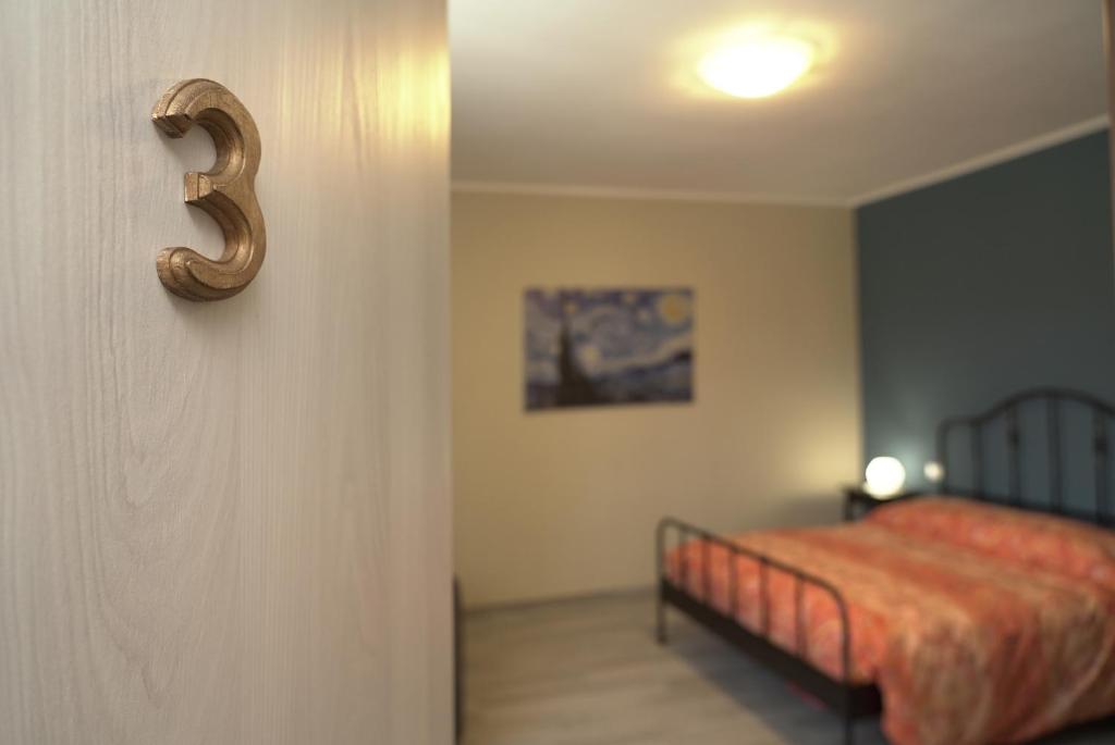 Posteľ alebo postele v izbe v ubytovaní Cascina Riva