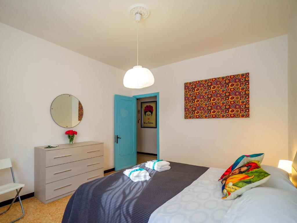 Postel nebo postele na pokoji v ubytování La Casa di Frida