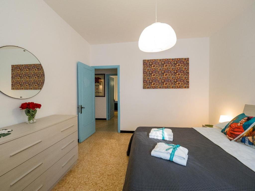 Postel nebo postele na pokoji v ubytování La Casa di Frida