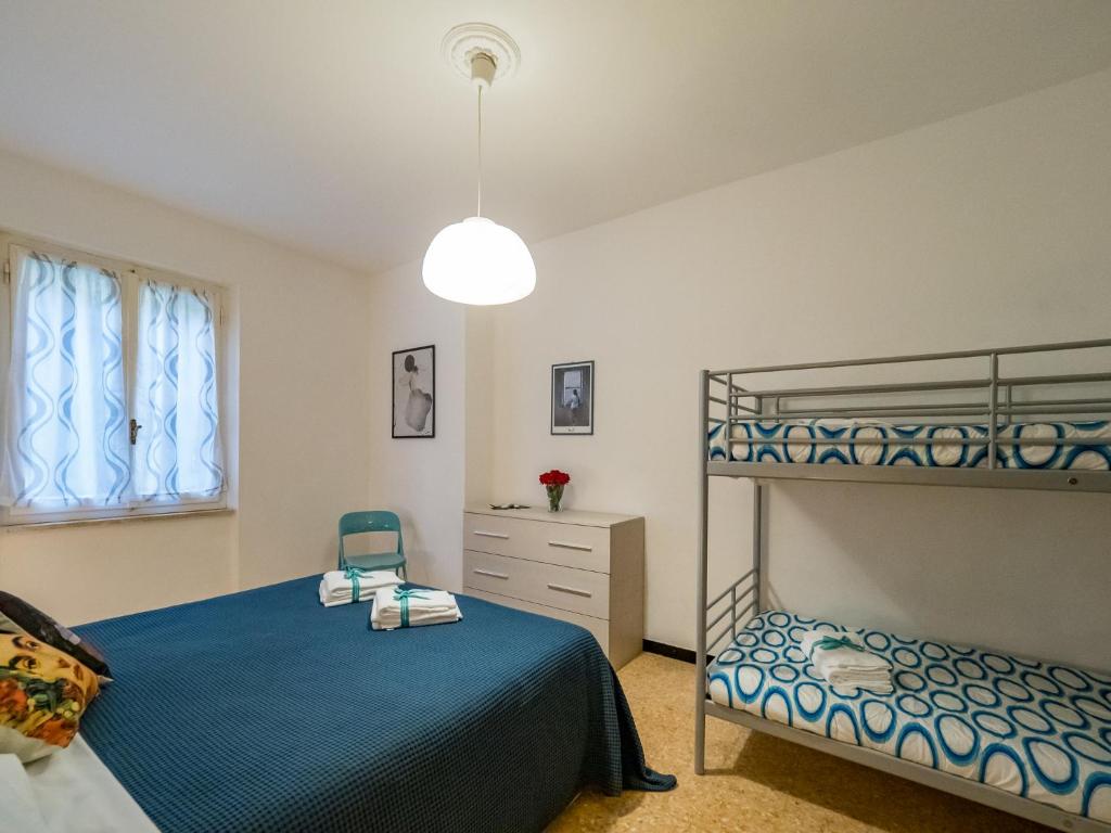Postel nebo postele na pokoji v ubytování La Casa di Frida