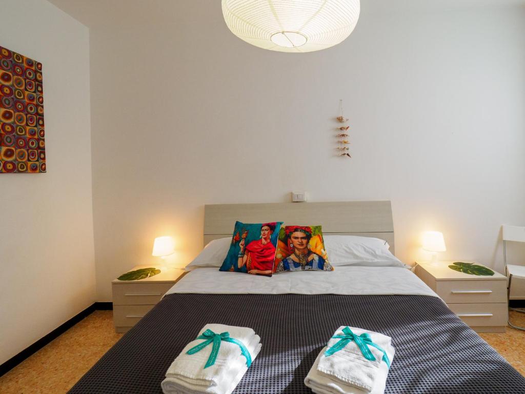 Postel nebo postele na pokoji v ubytování La Casa di Frida