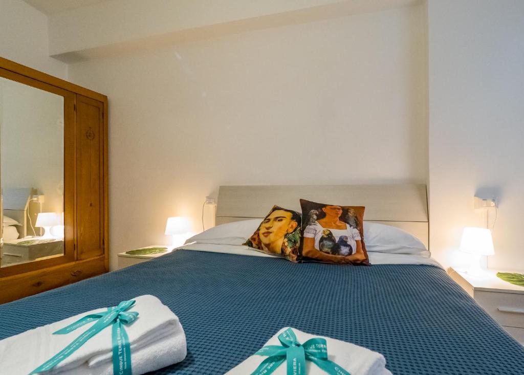 Postel nebo postele na pokoji v ubytování La Casa di Frida