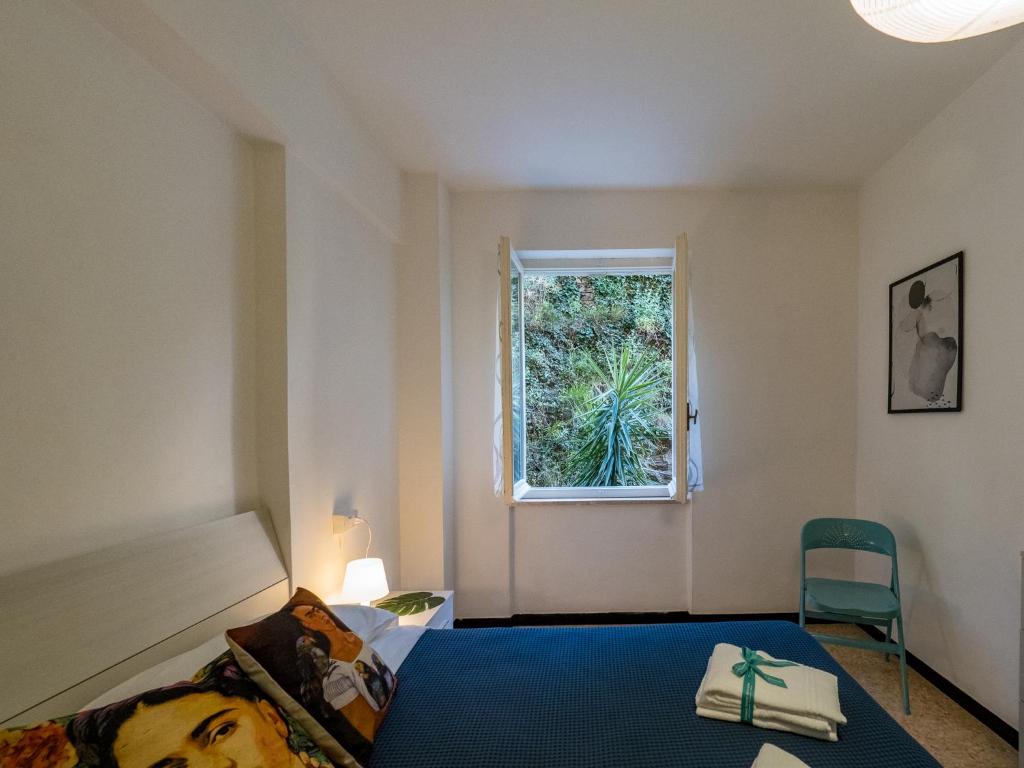 Postel nebo postele na pokoji v ubytování La Casa di Frida