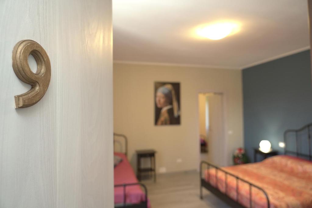Posteľ alebo postele v izbe v ubytovaní Cascina Riva
