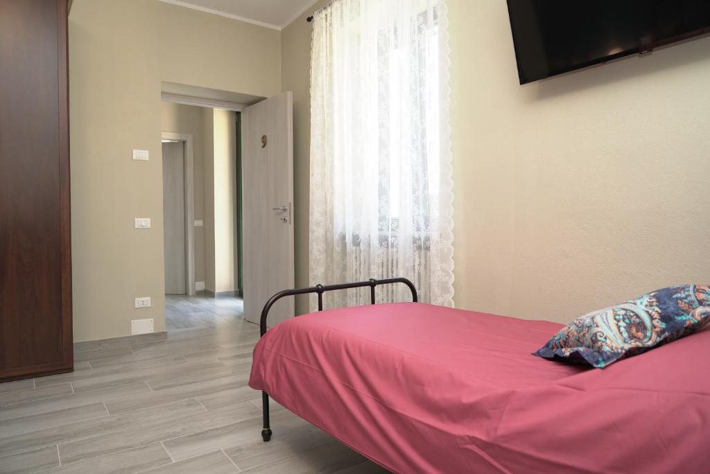 Posteľ alebo postele v izbe v ubytovaní Cascina Riva
