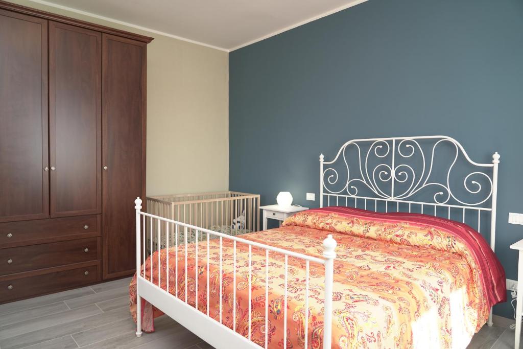 Posteľ alebo postele v izbe v ubytovaní Cascina Riva