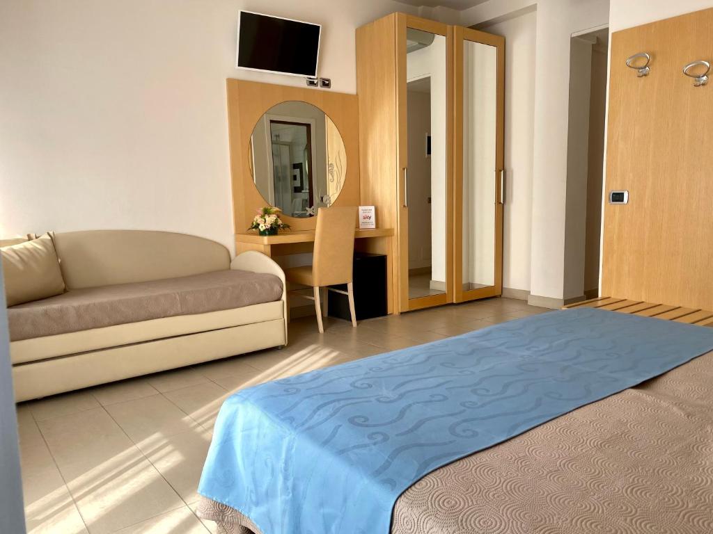 Postel nebo postele na pokoji v ubytování Hotel Granada
