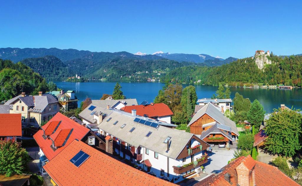 an aerial view of a town with a lake at DREAM Bled Apartments in Bled