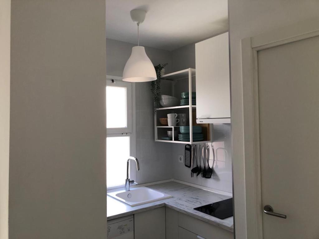A kitchen or kitchenette at Holidays2Malaga Alta Street 1 bedroom High Speed WIFI