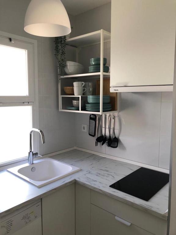 A kitchen or kitchenette at Holidays2Malaga Alta Street 1 bedroom High Speed WIFI
