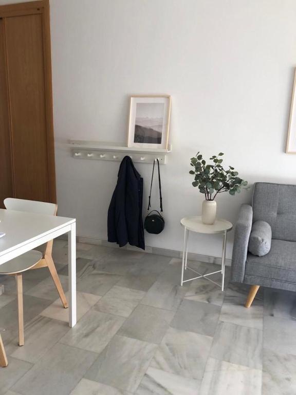 A seating area at Holidays2Malaga Alta Street 1 bedroom High Speed WIFI