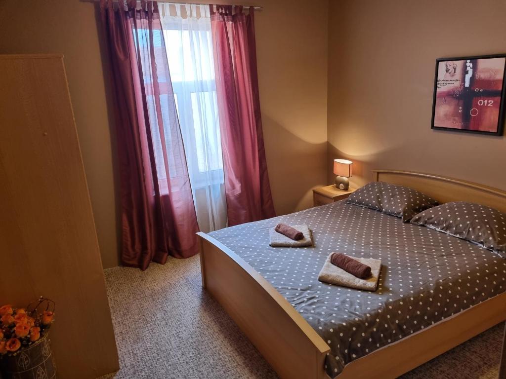 Postel nebo postele na pokoji v ubytování Apartment Lilly