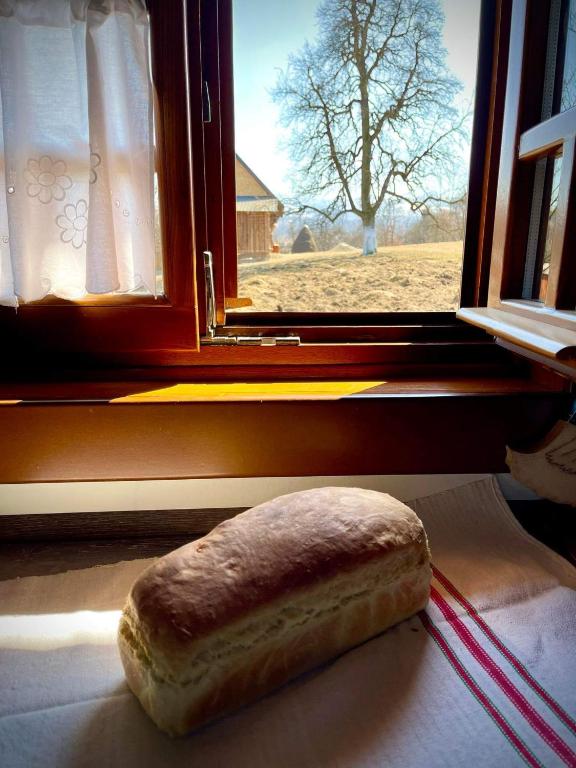 Postel nebo postele na pokoji v ubytování Pensiunea Agroturistica Casa Pribegilor