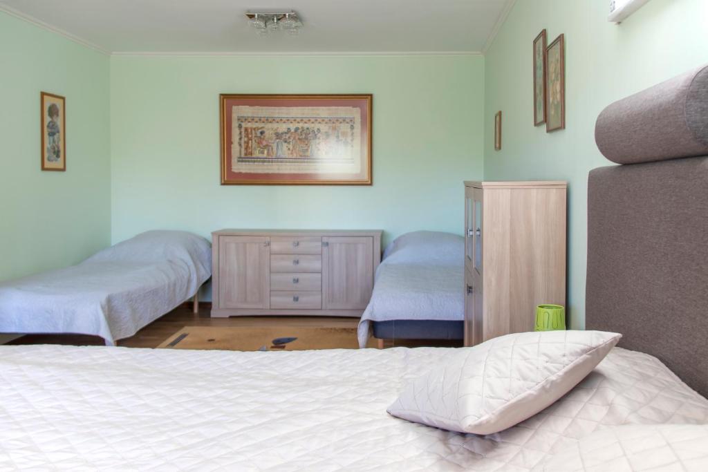 Postel nebo postele na pokoji v ubytování Villa Timmernabben