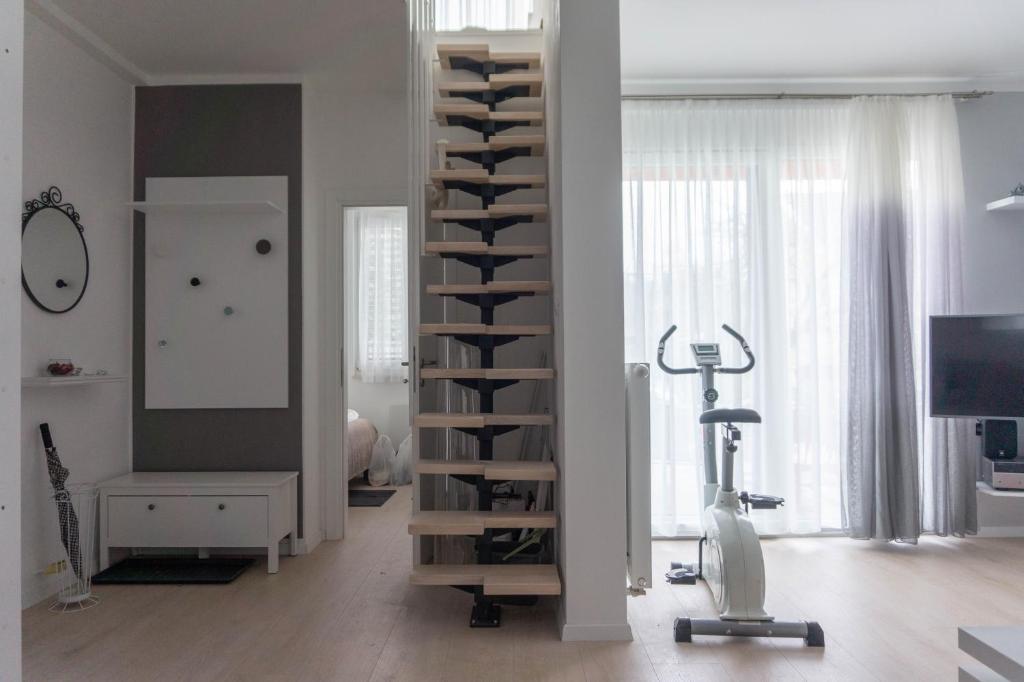 Televízia a/alebo spoločenská miestnosť v ubytovaní Apartment Maksimir Yard Zagreb