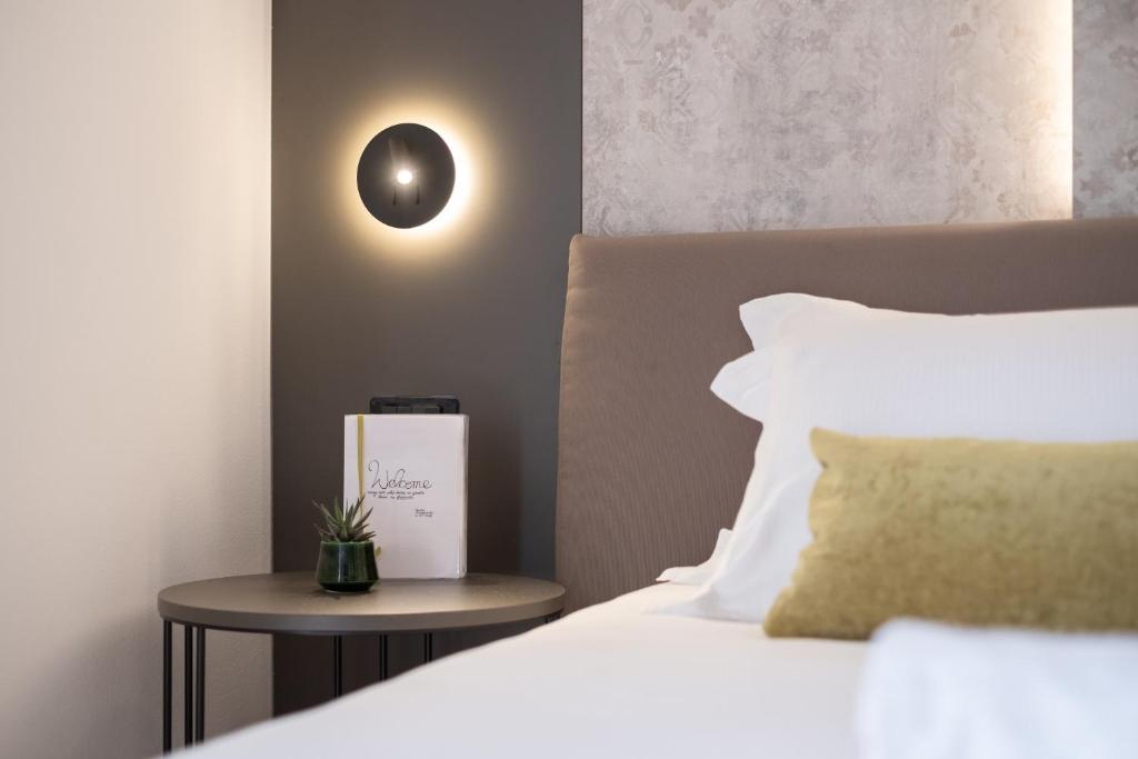 Postel nebo postele na pokoji v ubytování La Cipressina B&B