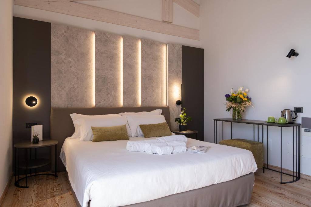 Postel nebo postele na pokoji v ubytování La Cipressina B&B