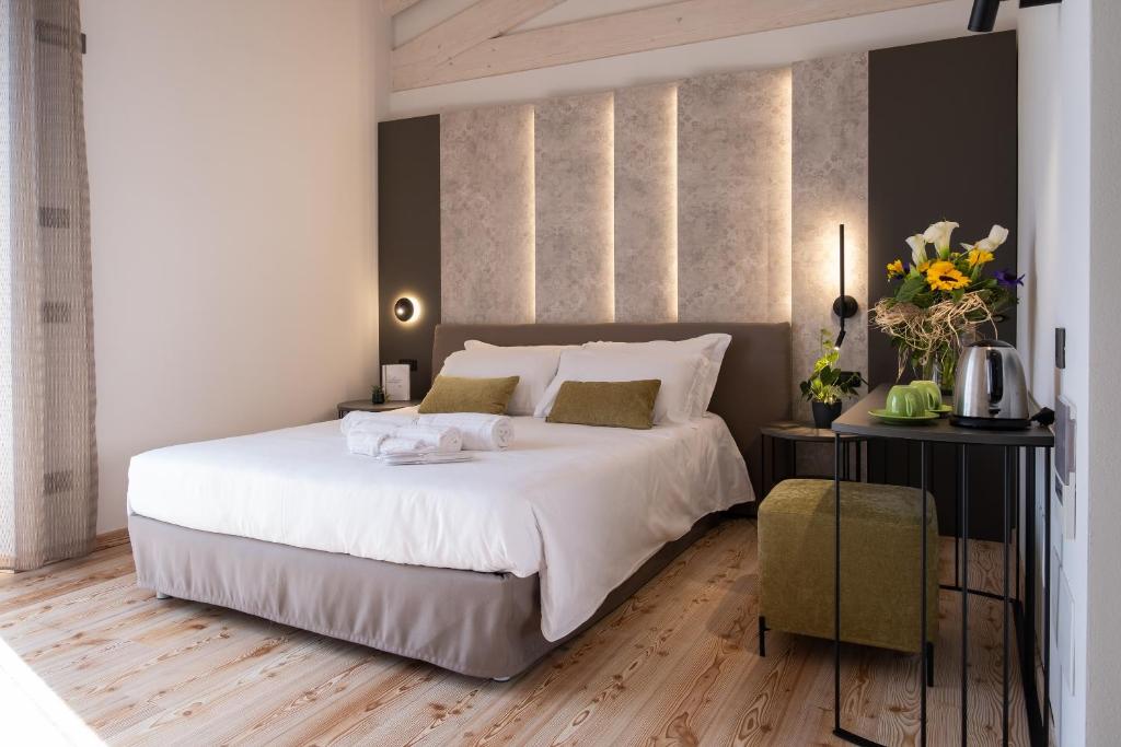 Postel nebo postele na pokoji v ubytování La Cipressina B&B