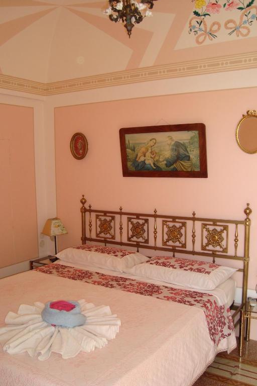 Postel nebo postele na pokoji v ubytování Masseria SD di Manchisi