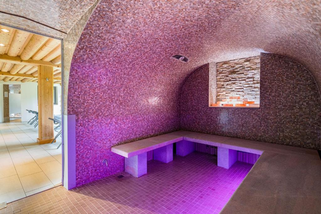 Posteľ alebo postele v izbe v ubytovaní Hotel NockResort
