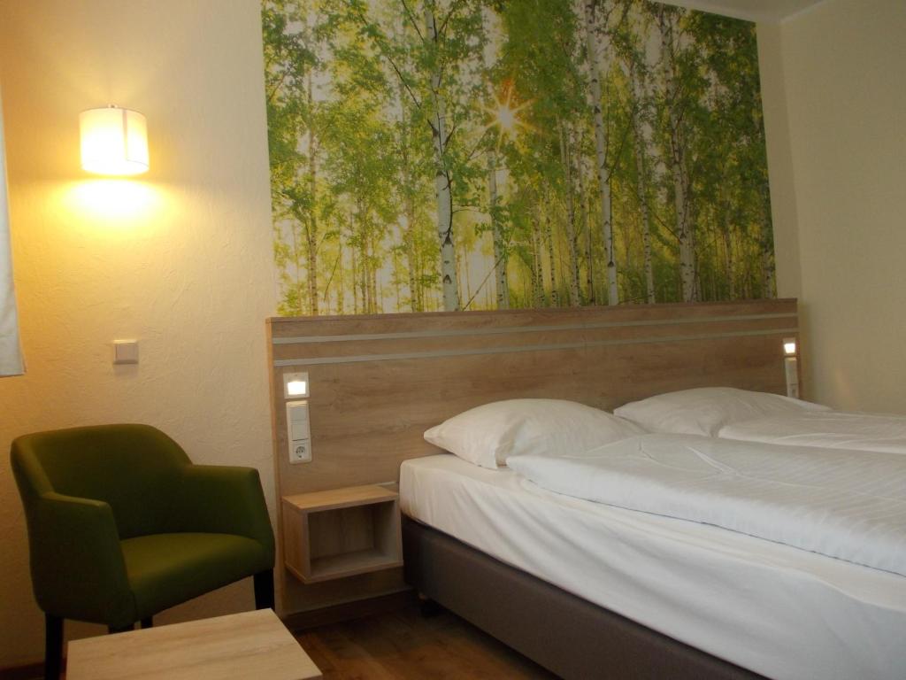 Postel nebo postele na pokoji v ubytování Berghotel Glockenberg