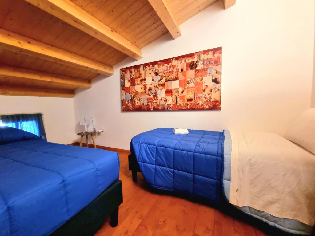 Postel nebo postele na pokoji v ubytování Beach Front Villas