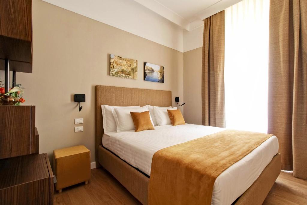 Кровать или кровати в номере HortiSallustio luxury rooms