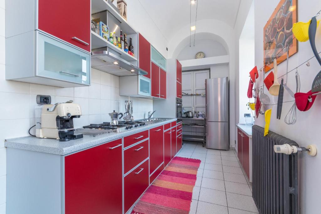 A kitchen or kitchenette at San Salvario Family Apartment by Wonderful Italy