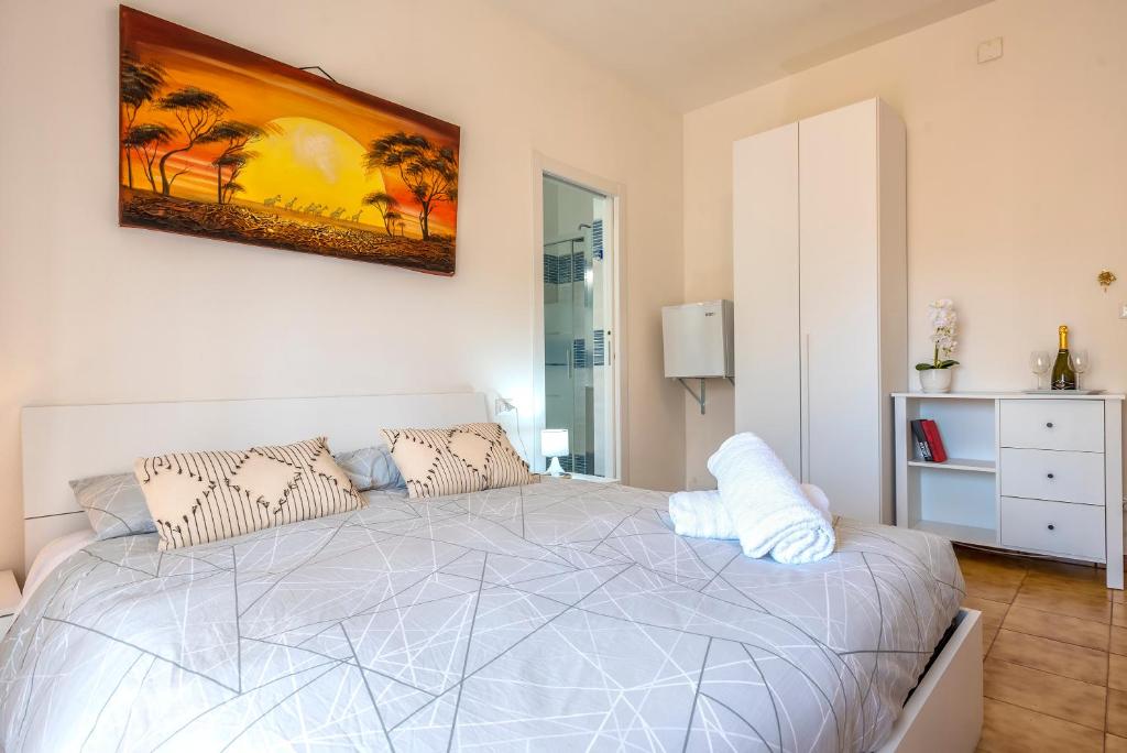 Postel nebo postele na pokoji v ubytování Sardinia rooms