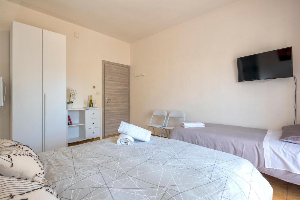 Postel nebo postele na pokoji v ubytování Sardinia rooms