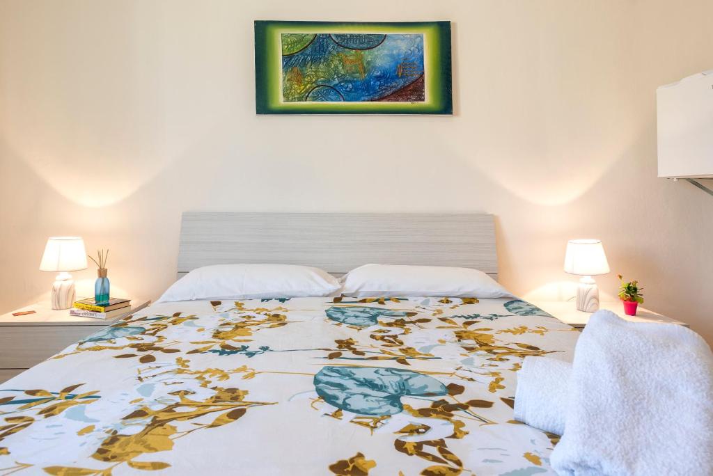 Postel nebo postele na pokoji v ubytování Sardinia rooms