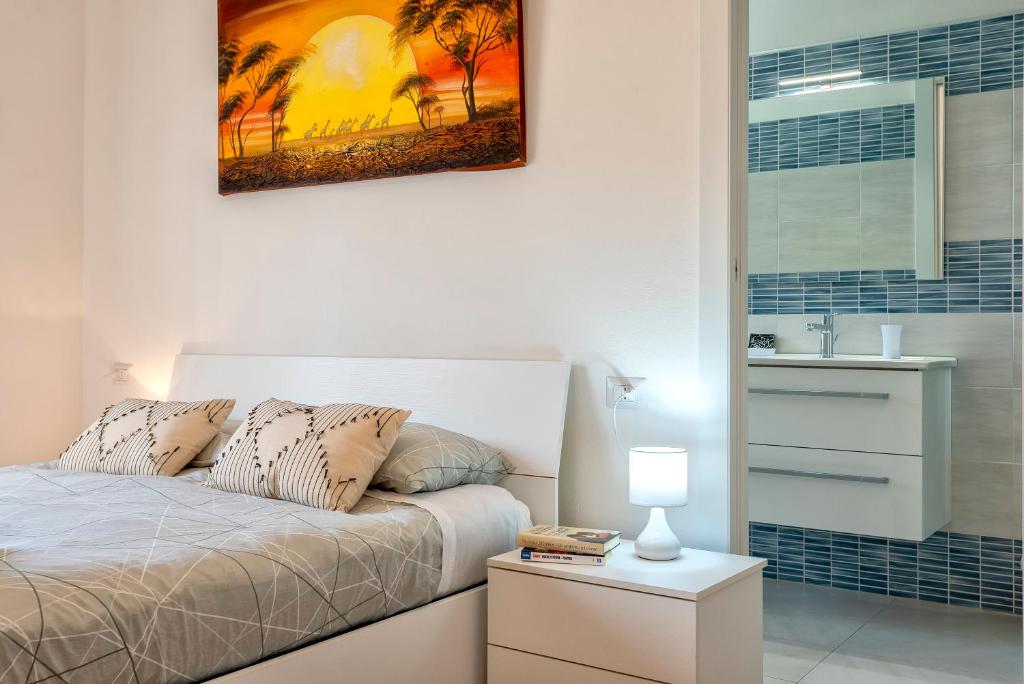 Postel nebo postele na pokoji v ubytování Sardinia rooms