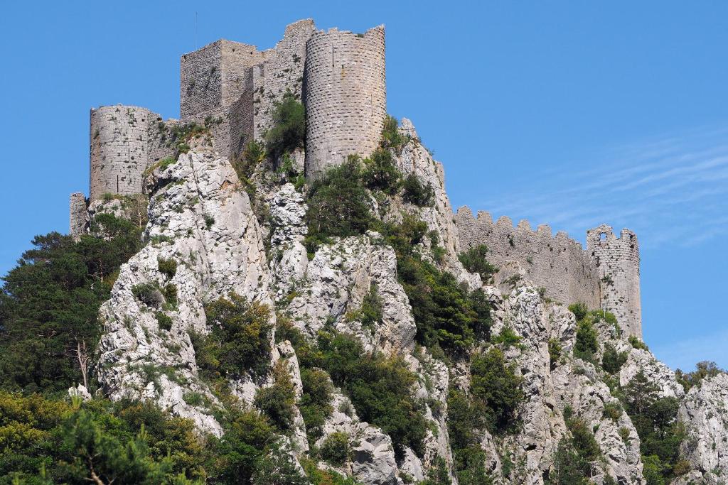 a castle sitting on top of a mountain at LA BOULZANE in Puilaurens