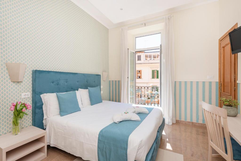 Postel nebo postele na pokoji v ubytování Hotel Parker - Gruppo BLAM HOTELS