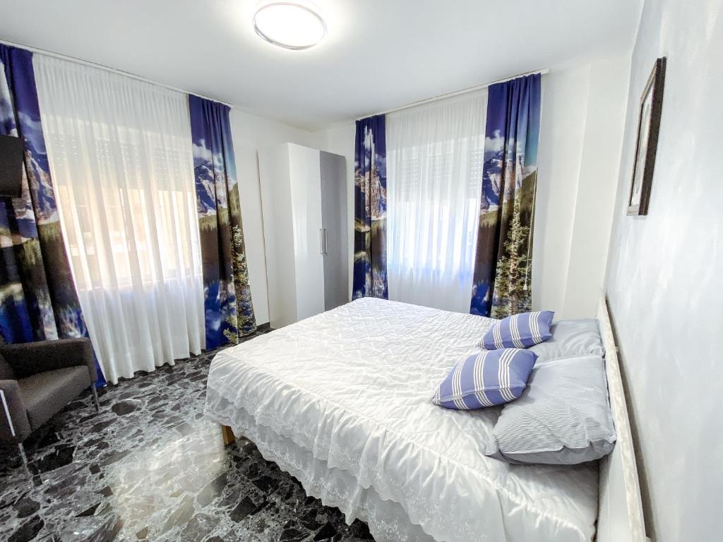 A bed or beds in a room at B&B Stella